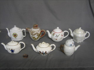 A collection of 7 various decorative tea pots