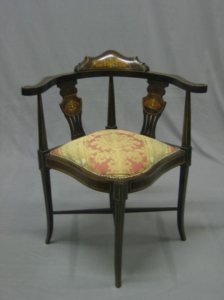 A Victorian inlaid mahogany corner chair with slat back
