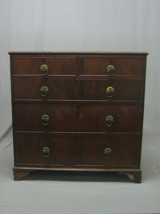 A William IV mahogany chest of 2 short and 3 long graduated drawers, raised on bracket feet