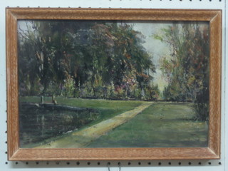 An Impressionist oil on board "Study of a Formal Garden with path and Lake" indistinctly signed dated 1913 9"x14"