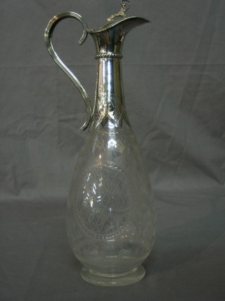 A Victorian etched glass claret jug with silver plated mount