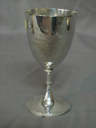 A silver plated goblet shaped trophy