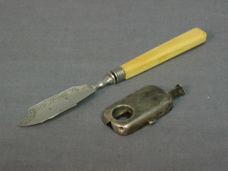 A silver cased cigar cutter and a silver ivory handled butter knife