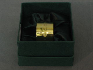 A silver gilt napkin ring commemorating the Queens Golden Jubilee, Fortnam and Mason, London 2002
