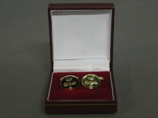 A pair of silver gilt cufflinks to commemorate the Queens Golden Jubilee, with Jubilee hallmarks