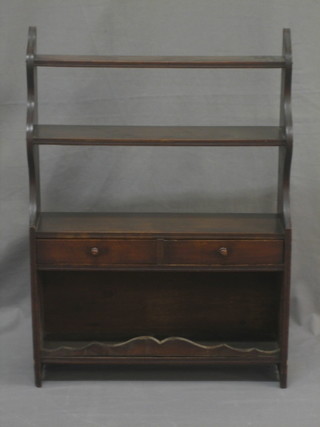 A 19th Century mahogany range of 3 shelves, the base fitted 2 long drawers 20"