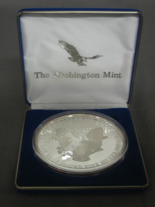 A 1996 American silver proof medallion, marked One Half Pound of Fine Silver 999, 8ozs
