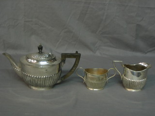 A matched Britannia metal 3 piece tea service with semi reeded decoration