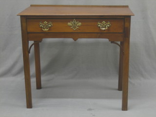 A 19th Century mahogany side table fitted a drawer and raised on square tapered supports 31"