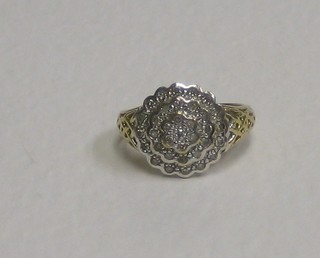 A gold cluster ring set diamonds
