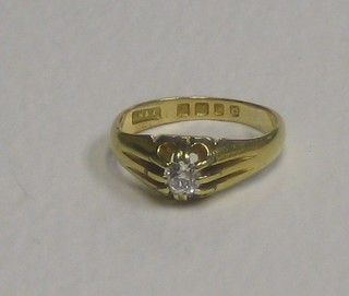 An 18ct gold gypsy ring set a diamond