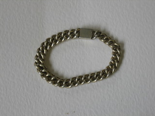 A "silver" curb link bracelet
