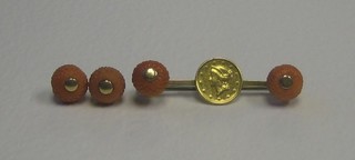 A gold bar brooch set a coin and with coral mounts together with a pair of coral stud earrings