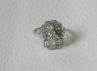 An 18ct white gold dress ring set 5 large baguette cut diamonds 1.58cts