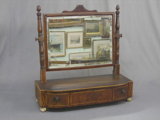 A rectangular Georgian dressing table mirror contained in a mahogany swing frame, the base fitted 1 long drawer flanked by 2 short drawers, raised on turned ivory feet 21"