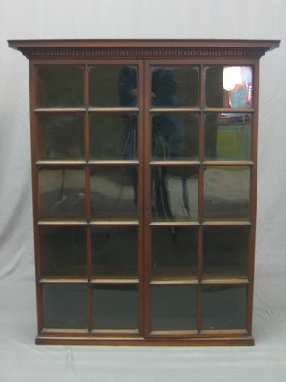 A 19th Century mahogany bookcase top with moulded and dentil cornice, the interior fitted adjustable shelves enclosed by astragal glazed doors 40"