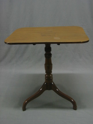 A 19th Century rectangular snap top wine table raised on pillar and tripod supports 25"