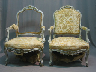 A handsome pair of French 19th Century open arm salon chairs with upholstered seats and backs