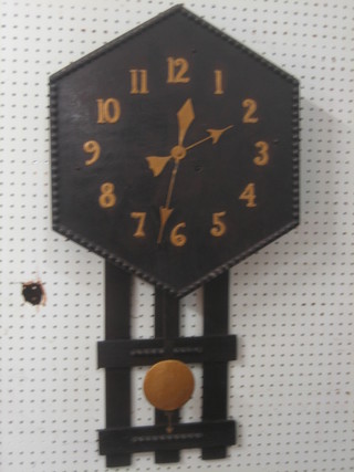 An Art Nouveau Voisy style octagonal oak clock with Arabic numerals