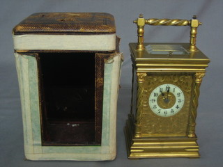 A Victorian French striking carriage clock with enamelled dial and Arabic numerals, contained in a gilt metal case, the reverse marked C R & Co made in Paris, complete with leather carrying case 6"