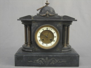 A Victorian French 8 day striking mantel clock with enamelled dial and Roman numerals contained in a black marble architectural case
