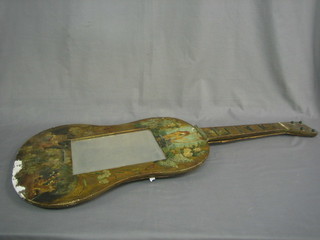 A rectangular bevelled plate wall mirror contained in a painted frame in the form of a guitar 10"
