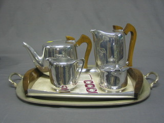 A 5 piece Picquot ware tea service, comprising teapot, hotwater jug, milk jug, sugar bowl and twin handled tea tray