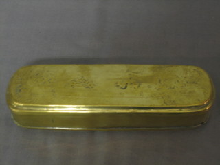 An 18th Century oval embossed brass box with hinged lid 6"