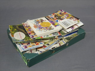 A collection of various tea card albums and various loose tea cards
