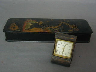 A Victorian rectangular glove box with chinoiserie decoration and hinged lid 11" together with a travelling clock