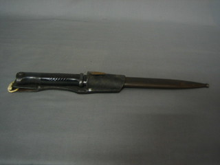 A German bayonet with metal scabbard, blade marked Euf D.U. Horster