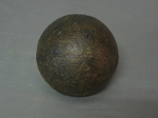 A carved iron cannon ball 3"