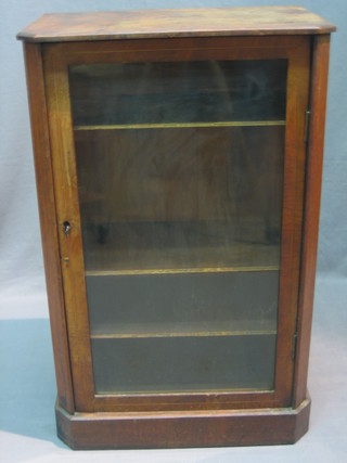 A Victorian figured walnut pier cabinet the interior fitted a shelf enclosed by a glazed panelled door 31"