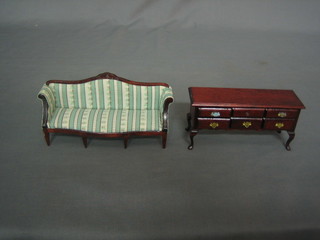 A dolls house mahogany dresser base fitted 6 drawers 5" and a sofa 6"