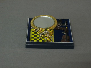 A dolls house chessboard and pieces, a violin, a clock garniture set, an oval gilt framed mirror and a pair of ice skates