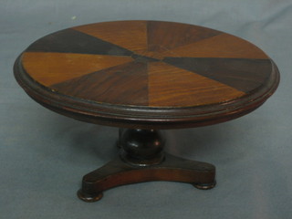 A William IV style apprentice circular mahogany snap top breakfast table, inlaid quadrant panels, raised on pillar and tripod supports with triform base 7"