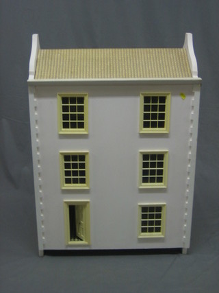 A Victorian style white painted dolls house 24"