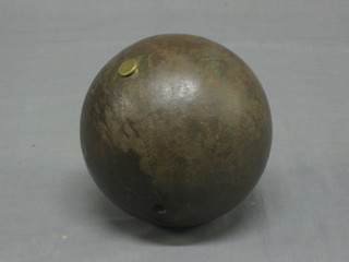 A cast iron cylindrical "cannon ball" 6"