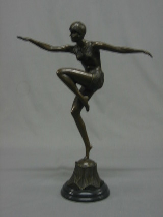 An Art Deco style bronze figure of a dancing girl raised on a marble base 18"