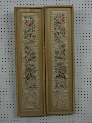 A pair of Oriental embroidered rectangular panels decorated fabulous birds 22" x 4"