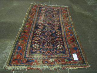 A Caucasian rug with multi row borders (some wear) 69"x36"
