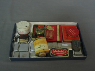 A collection of various measures, match boxes etc