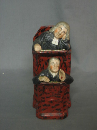 A Staffordshire figure in the form of The Vicar and Moses, 10"