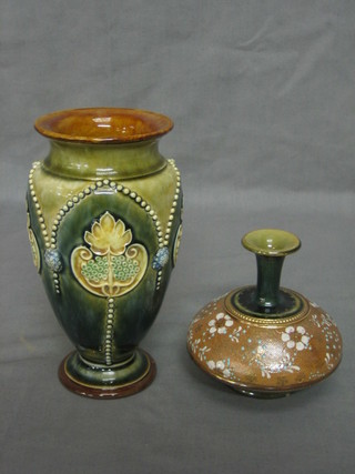 A circular Doulton Lambeth salt glazed vase, the base marked Doulton Lambeth and impressed 8425B and incised WB 7" and a squat shaped Doulton vase (f and r) 4"