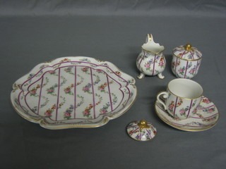 A 19th/20th Century Continental porcelain  cabaret set comprising tray, sucrier (lid f), cream jug, 1 extra lid and coffee cup and saucer