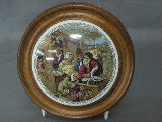 A 19th Century Prattware pot lid decorated a Travelling Fishmonger 4" contained in a wooden socle frame