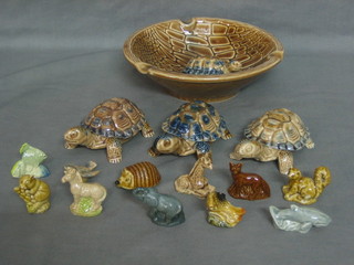 A circular Wade ashtray decorated a tortoise, 3 Wade trinket boxes in the form of tortoises and 11 various Wade Whimsies