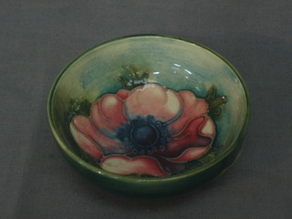 A circular Moorcroft bowl decorated Anemone, the base impressed Moorcroft, Made in England 3"