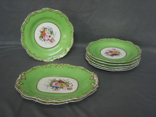 A Victorian 8 piece dessert service comprising 2 oval dishes 11" (1 chipped) and 6 plates 9", with green and gilt banding and floral decoration to the centre, some wear, the reverse marked 3551