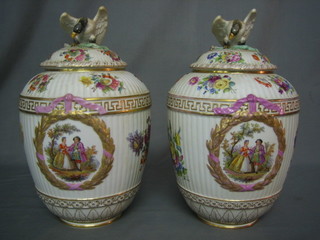 A handsome pair of 19th Century "Berlin" porcelain urns and lids, the urns with panel decoration depicting flowers and romantic scenes, the lids with finials in the form of birds 14", base with sceptre mark